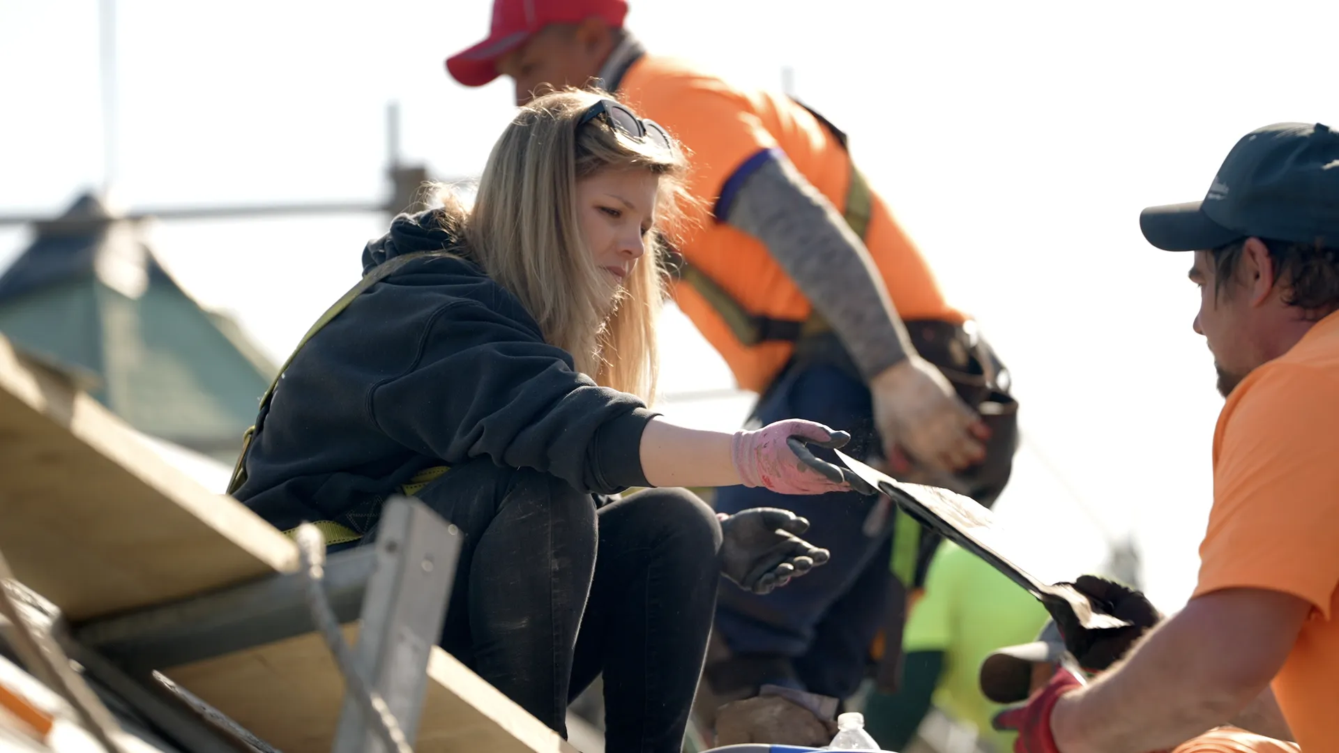 Kate Russo and the Crown Contracting crew on a rooftop job at 99 High Street.