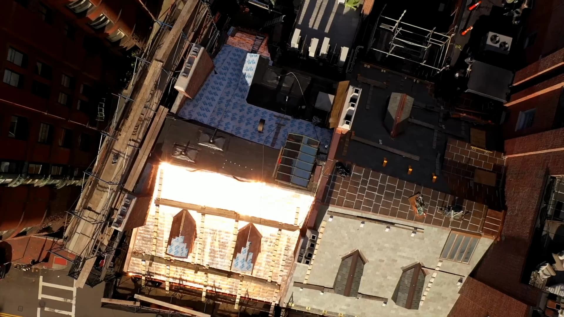 Aerial drone pass over a Crown Contracting roof project in Boston.