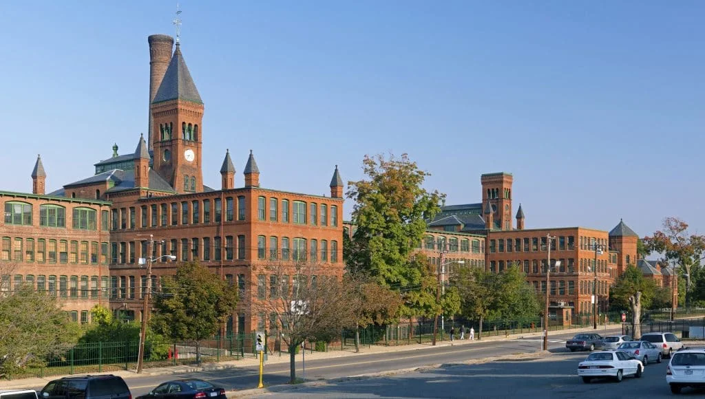 The clock tower and brick mills of the historic Waltham Watch Factory.